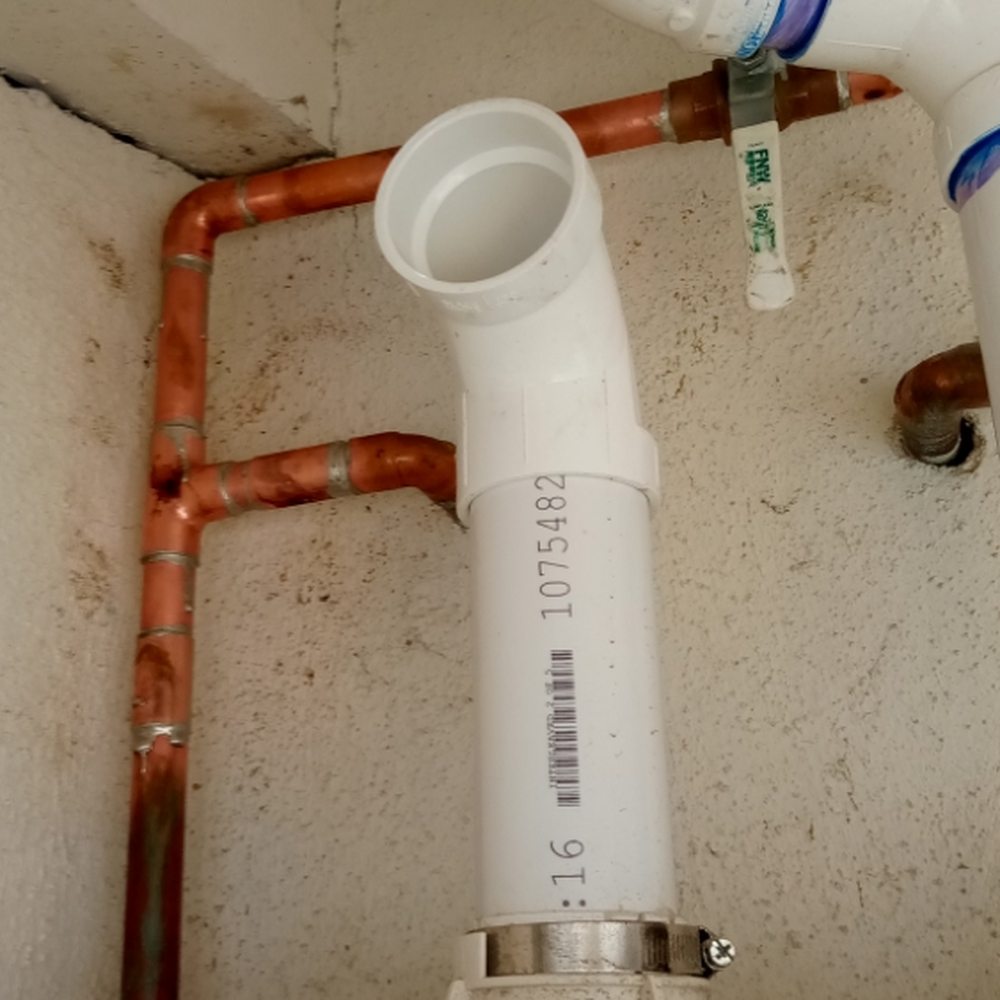 Toilet repair and re-set performed by Andy Rooter